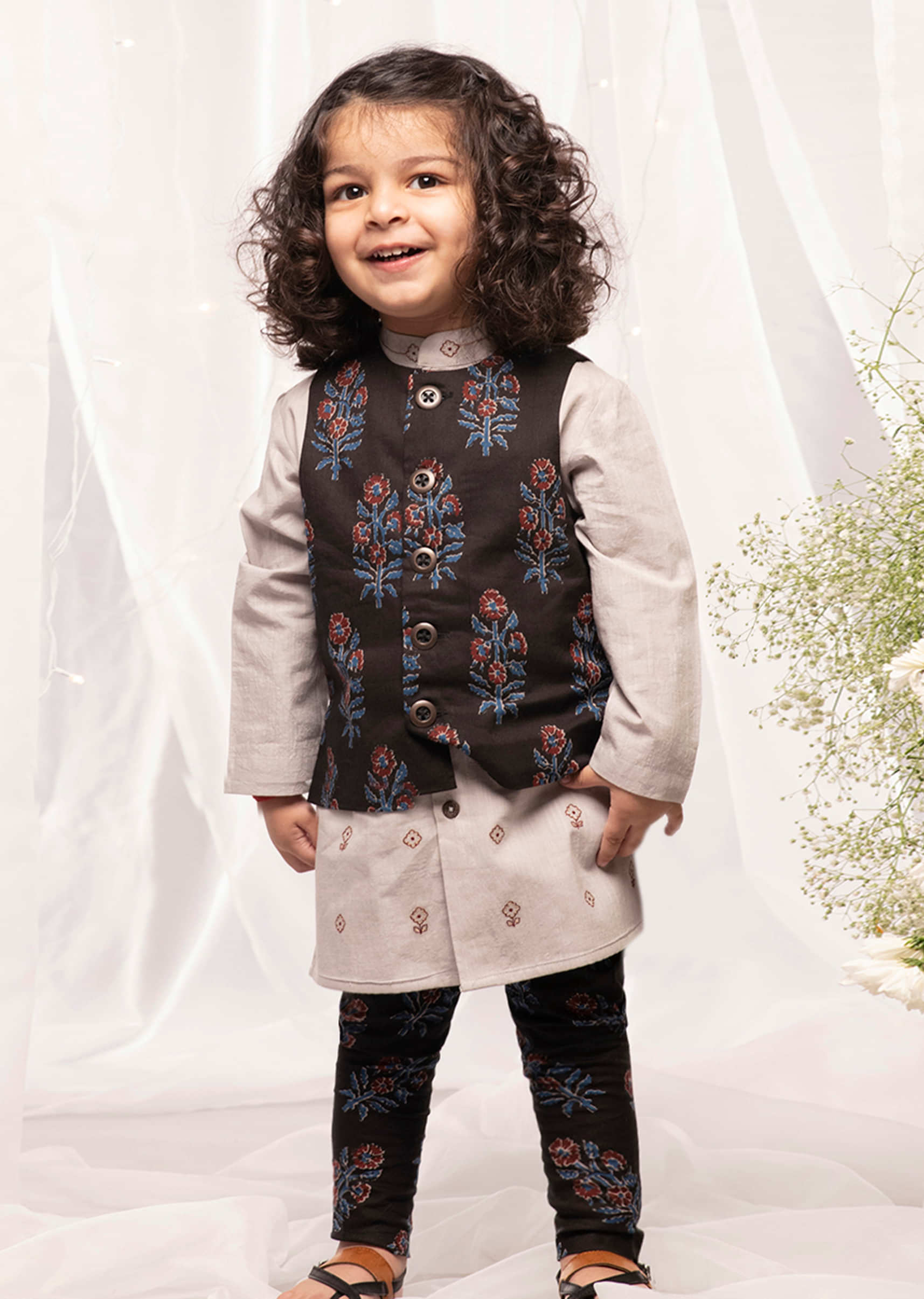Kalki Boys Black Nehru Jacket And Kurta Set With Floral Print And Embroidery Detailing By Tiber Taber