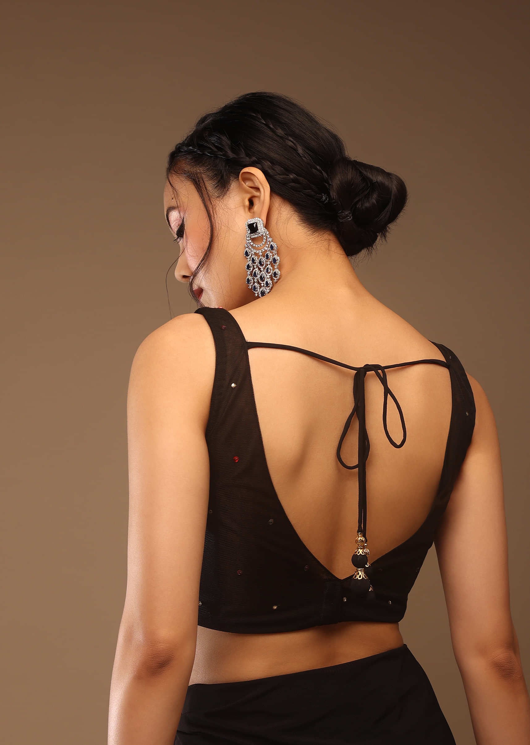Black Saree With A Crop Top In Multi-Colored Sequins Embellishment Padded With Tie-Up Tassel Dori At The Back