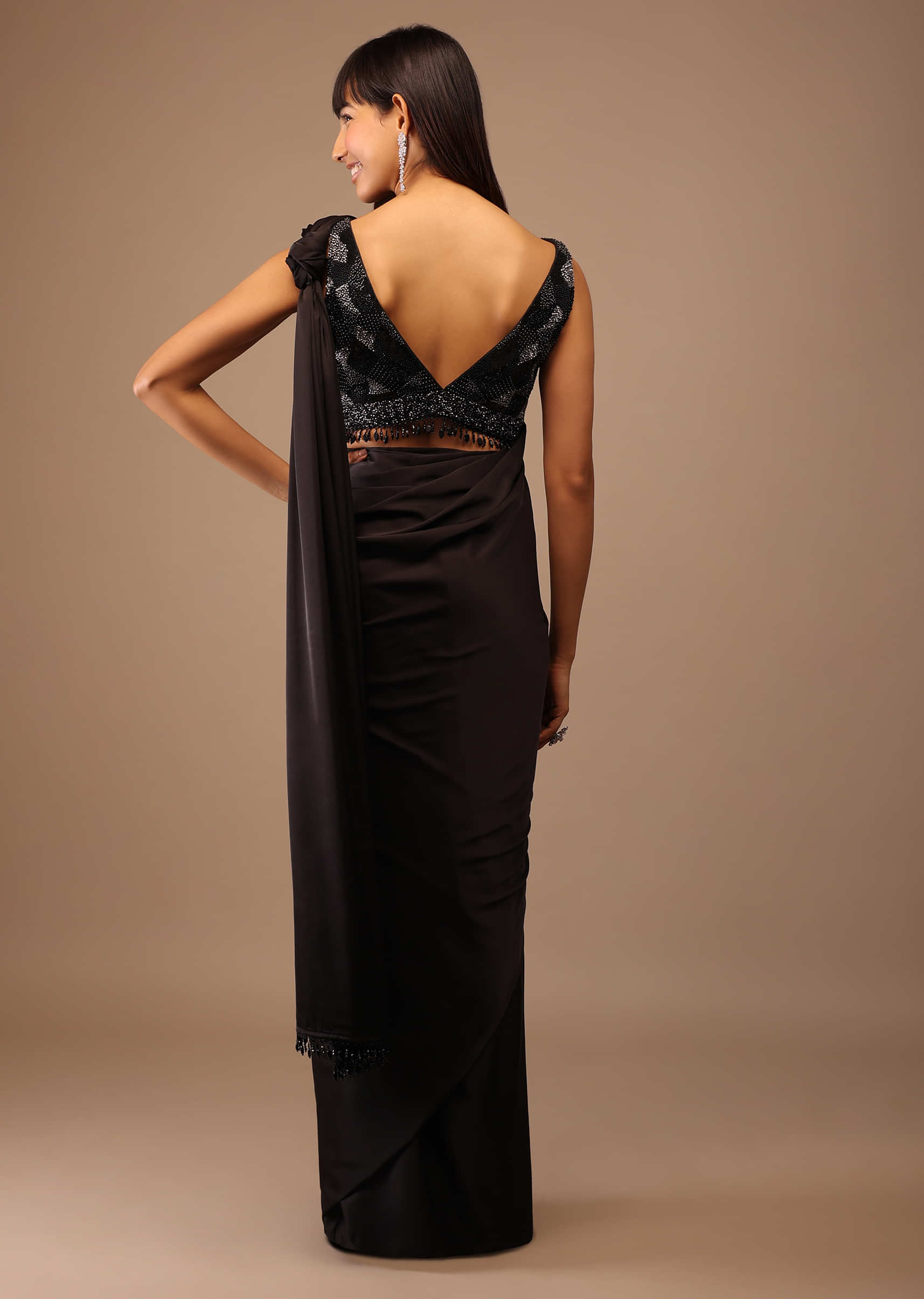 Black Satin Saree With Hand Embroidered Blouse With Fringes On The Hem