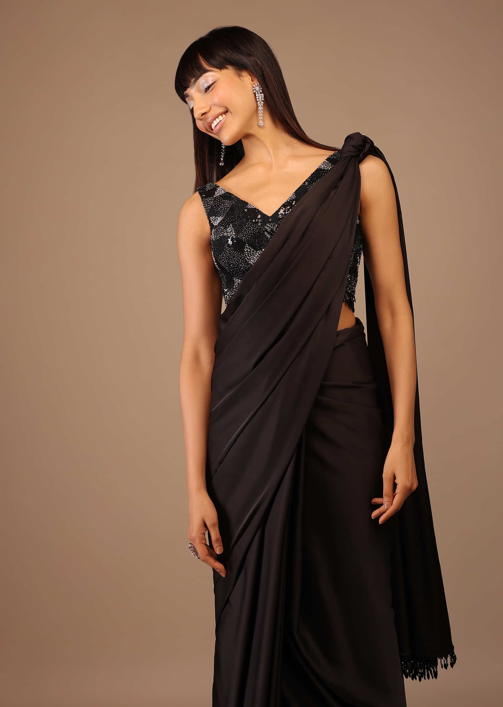 Black Satin Saree With Hand Embroidered Blouse With Fringes On The Hem