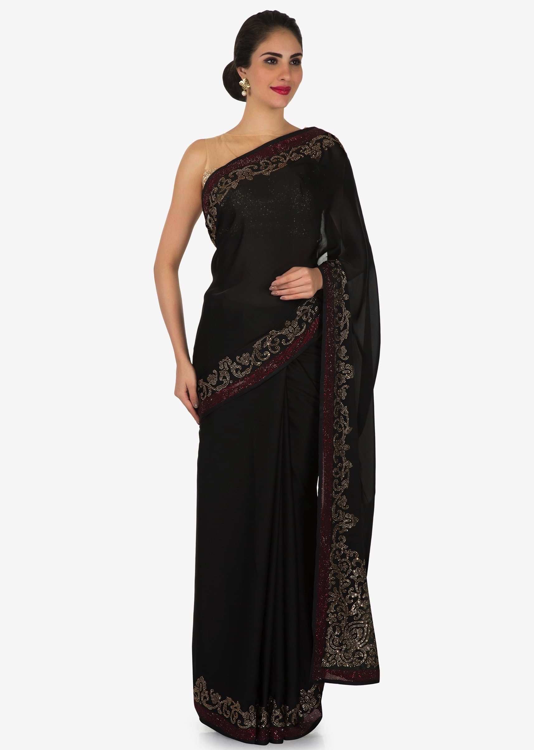 Black satin silk saree with unstitched blouse adorn in kundan embroidery work only on Kalki