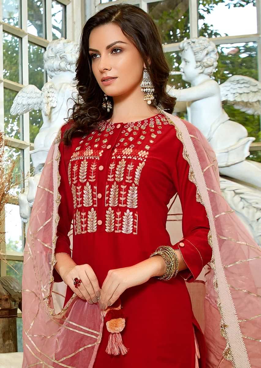 Blood red sharara suit adorn in mirror, zardosi and gotta patch embroidery 