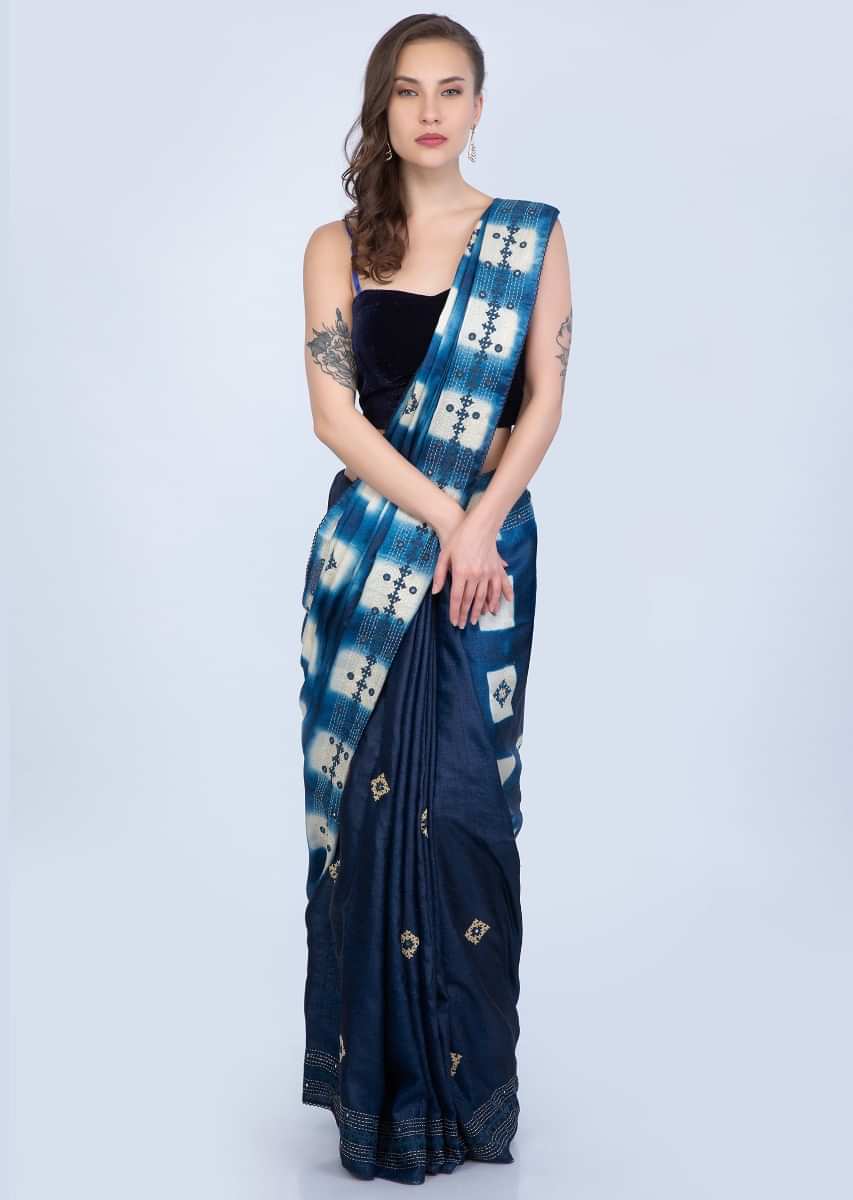 Blue shaded half and half tussar silk saree with embroidered butti and batik print only on Kalki