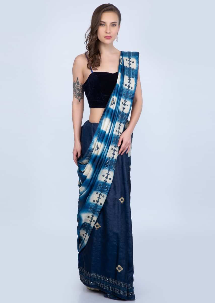 Blue shaded half and half tussar silk saree with embroidered butti and batik print only on Kalki