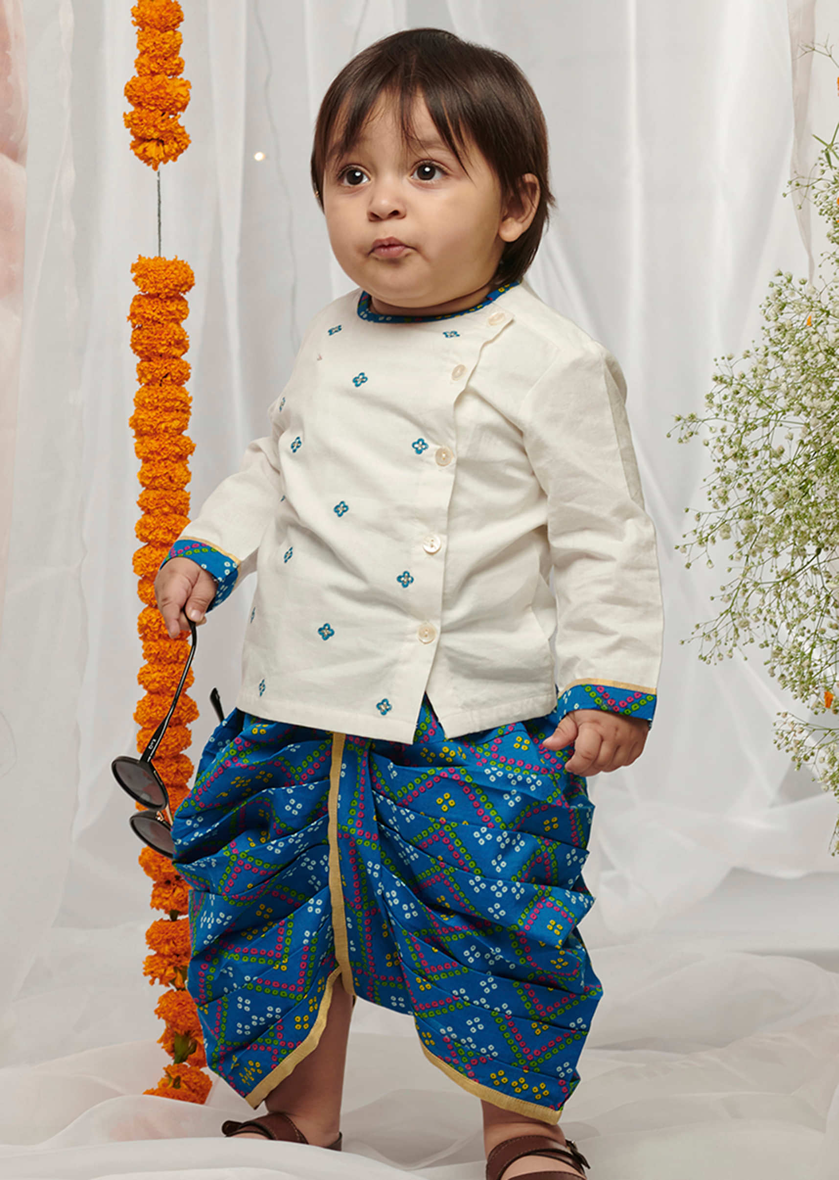 Kalki Boys Blue And White Dhoti Set With Bandhani Print And Embroidered Floral Motifs By Tiber Taber