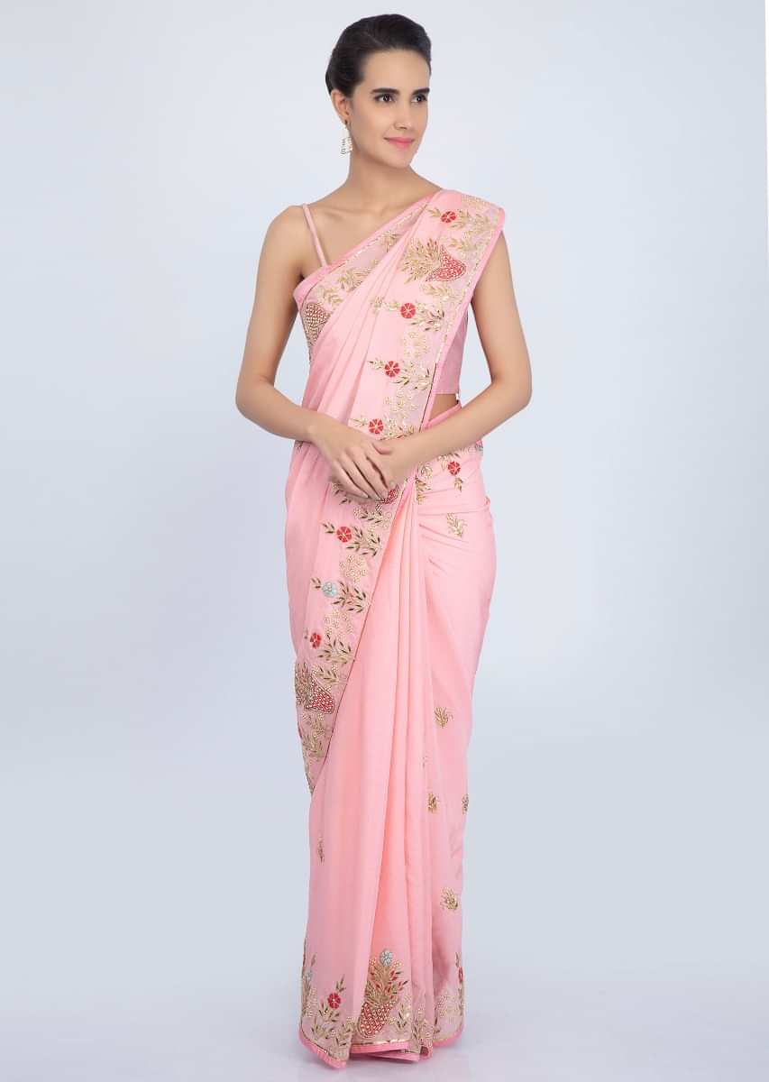 Blush pink crepe chiffon saree with floral embroidered butti and border only on Kalki