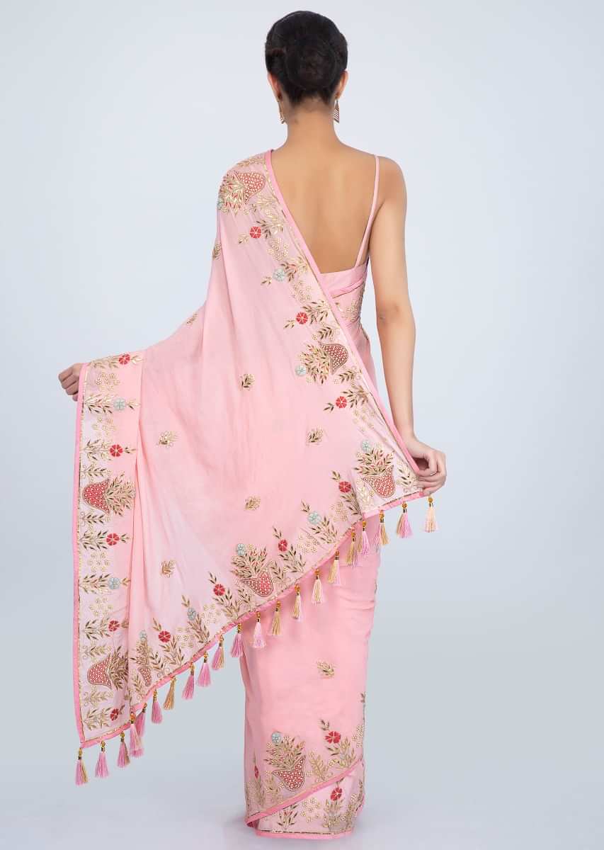 Blush pink crepe chiffon saree with floral embroidered butti and border only on Kalki