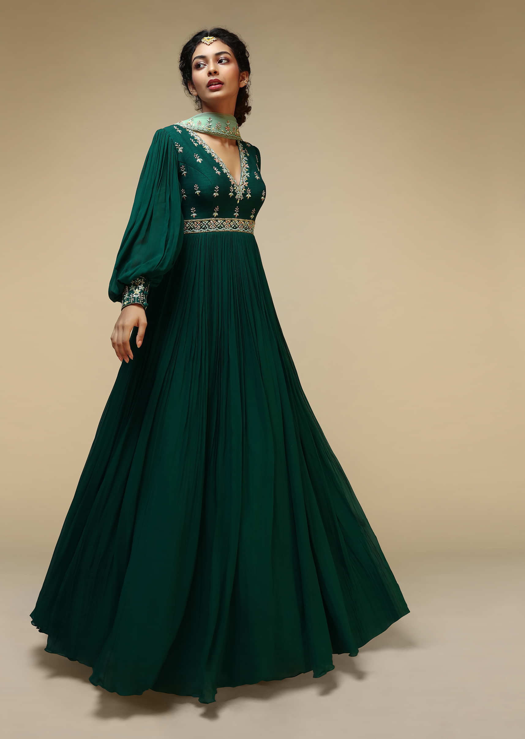 Bottle Green Anarkali Suit With Balloon Sleeves And Hand Embroidered Buttis Using Multi Colored Sequins And Beads  