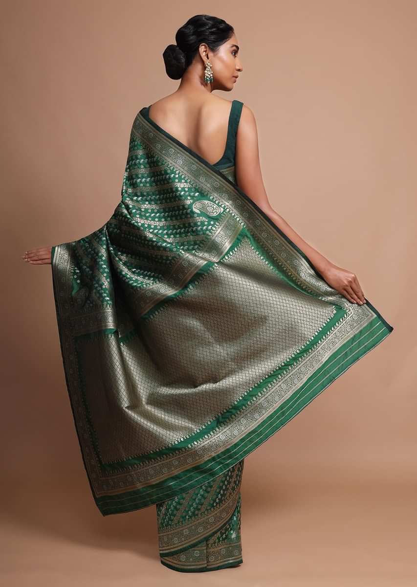 Bottle Green art handloom Saree In Silk With Weaved Floral Design In Diagonal Pattern