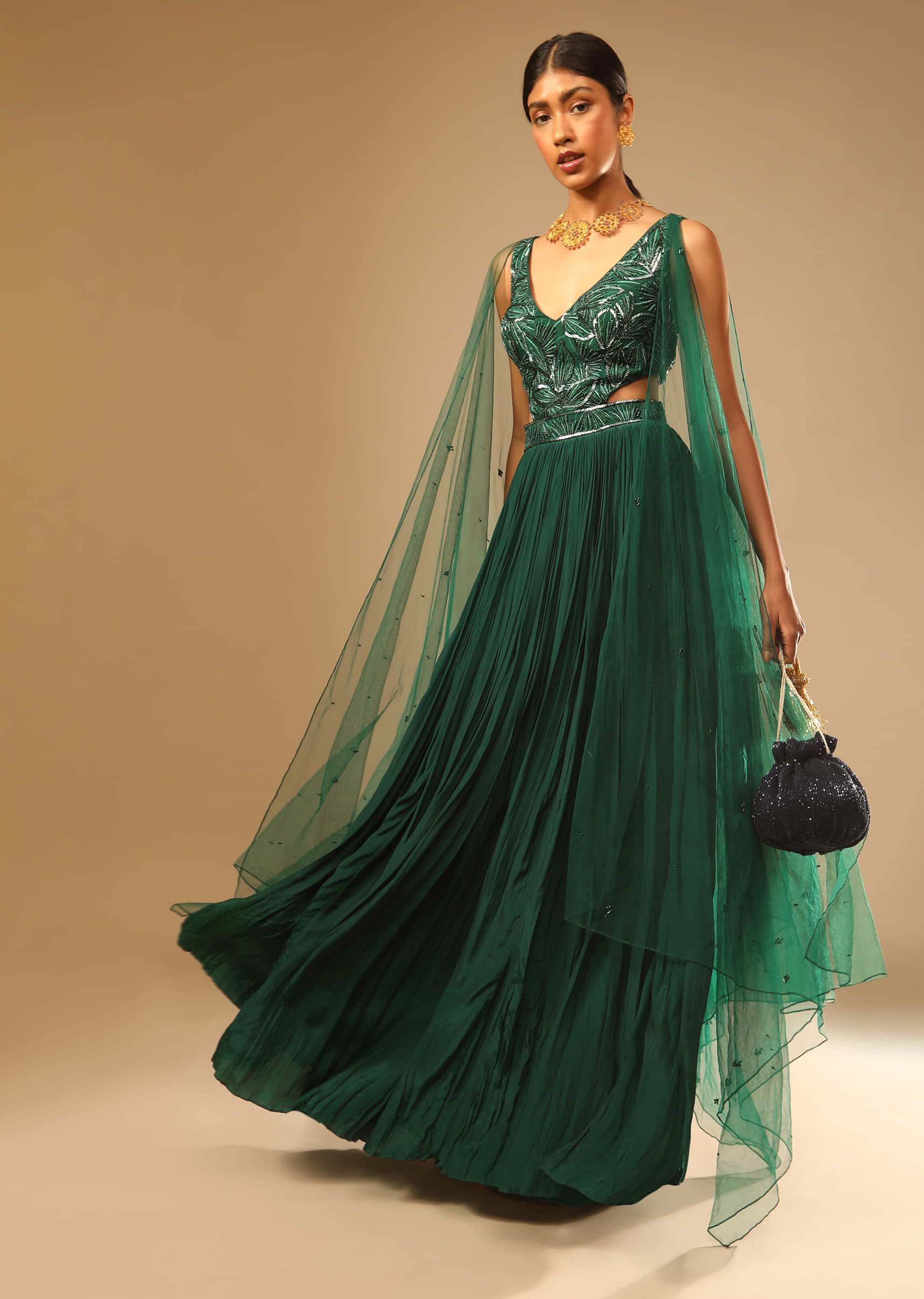 Bottle Green Gown In Crepe With Side Cut Outs In The Hand Embroidered Bodice  