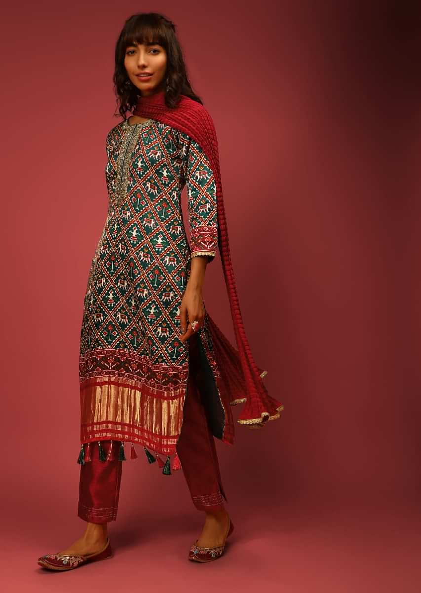 Bottle Green Straight Cut Satin Blend Suit With Patola Print And Brocade Border Edged In Tassels
