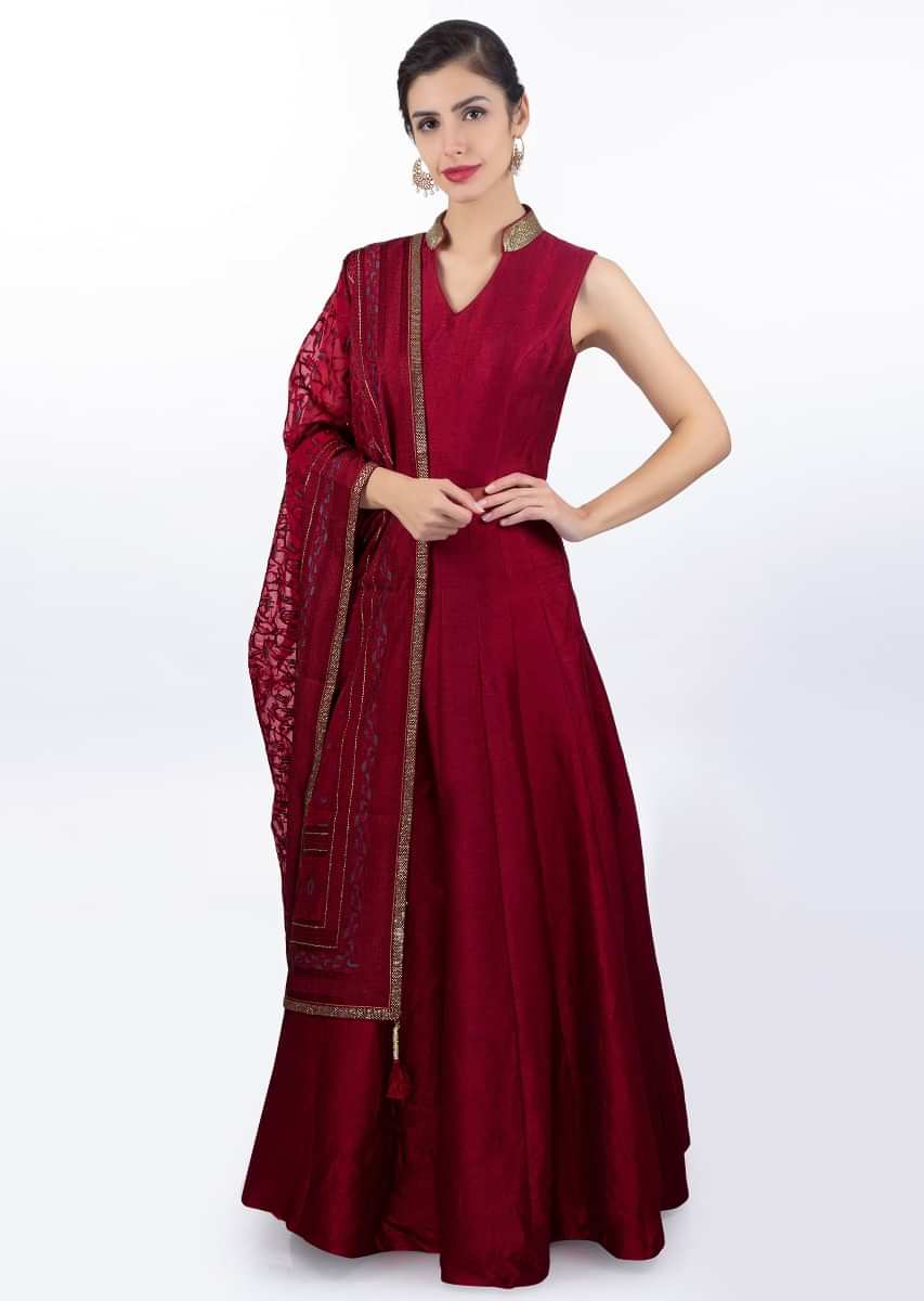 Brick red raw silk anarkali dress paired with a self embroidered organza dupattaonly on Kalki