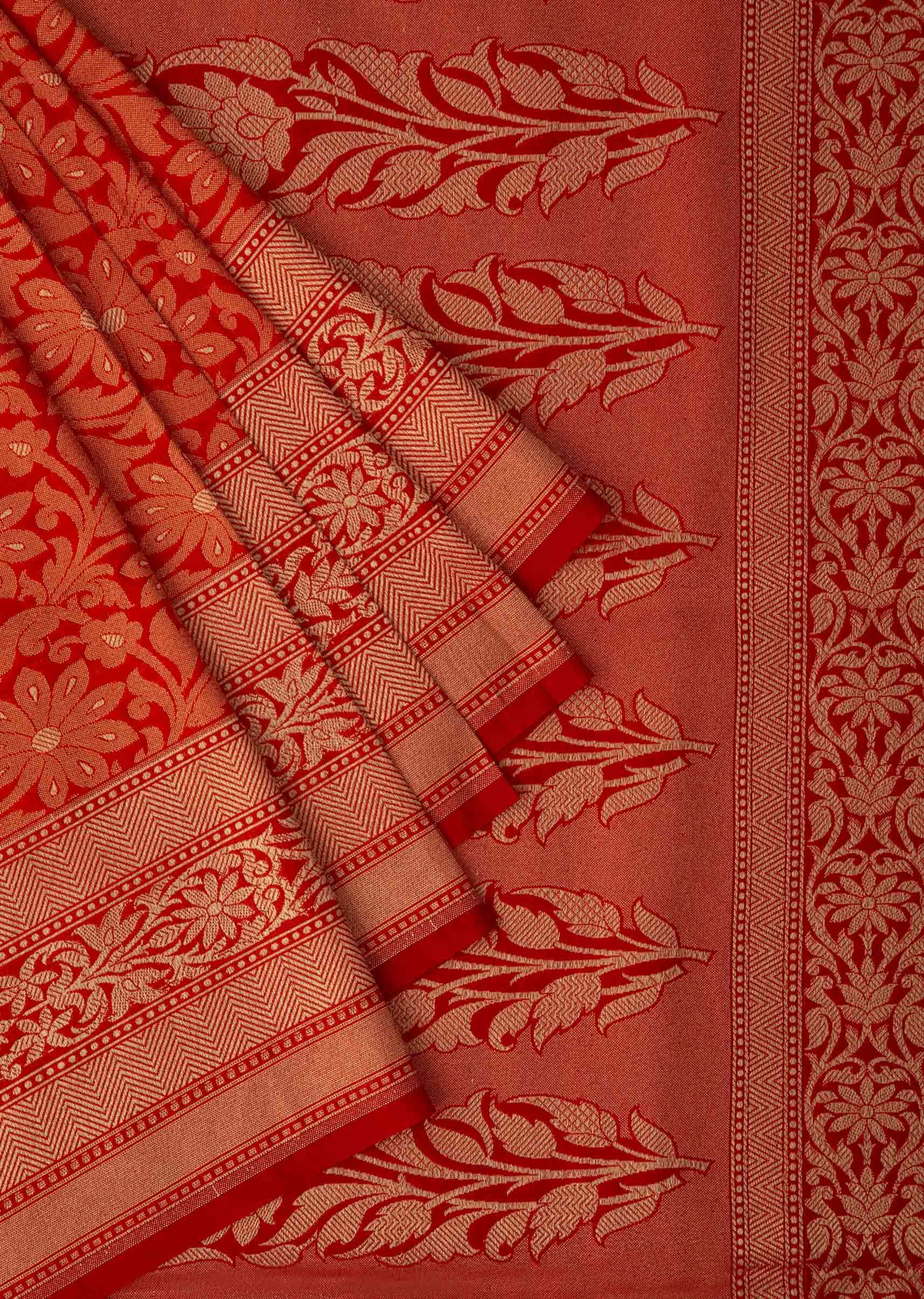 Bright red saree in chanderi silk with weaved jaal and floral butt