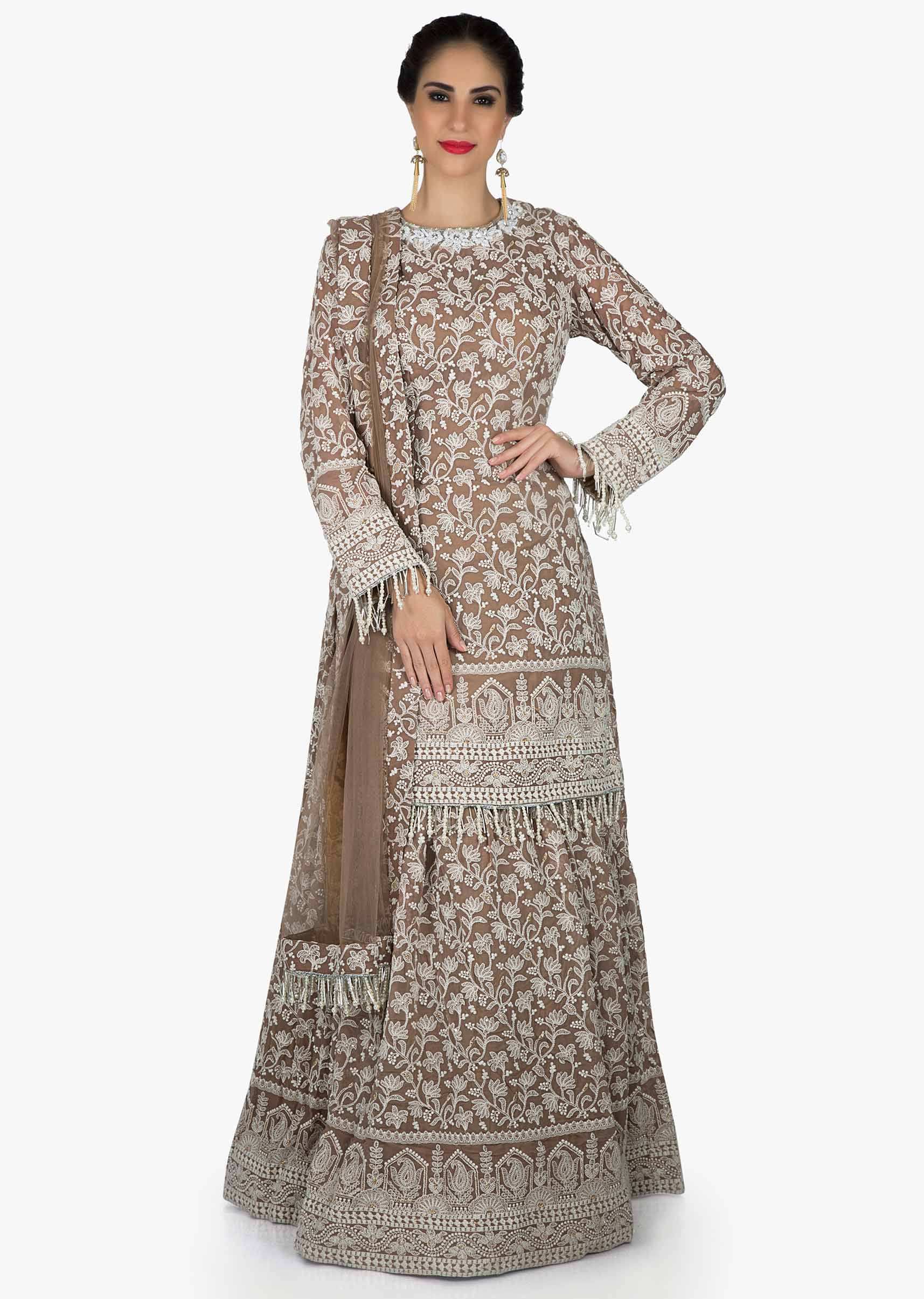 Brown lehenga with long blouse in white thread embroidery with fancy tassel only on Kalki