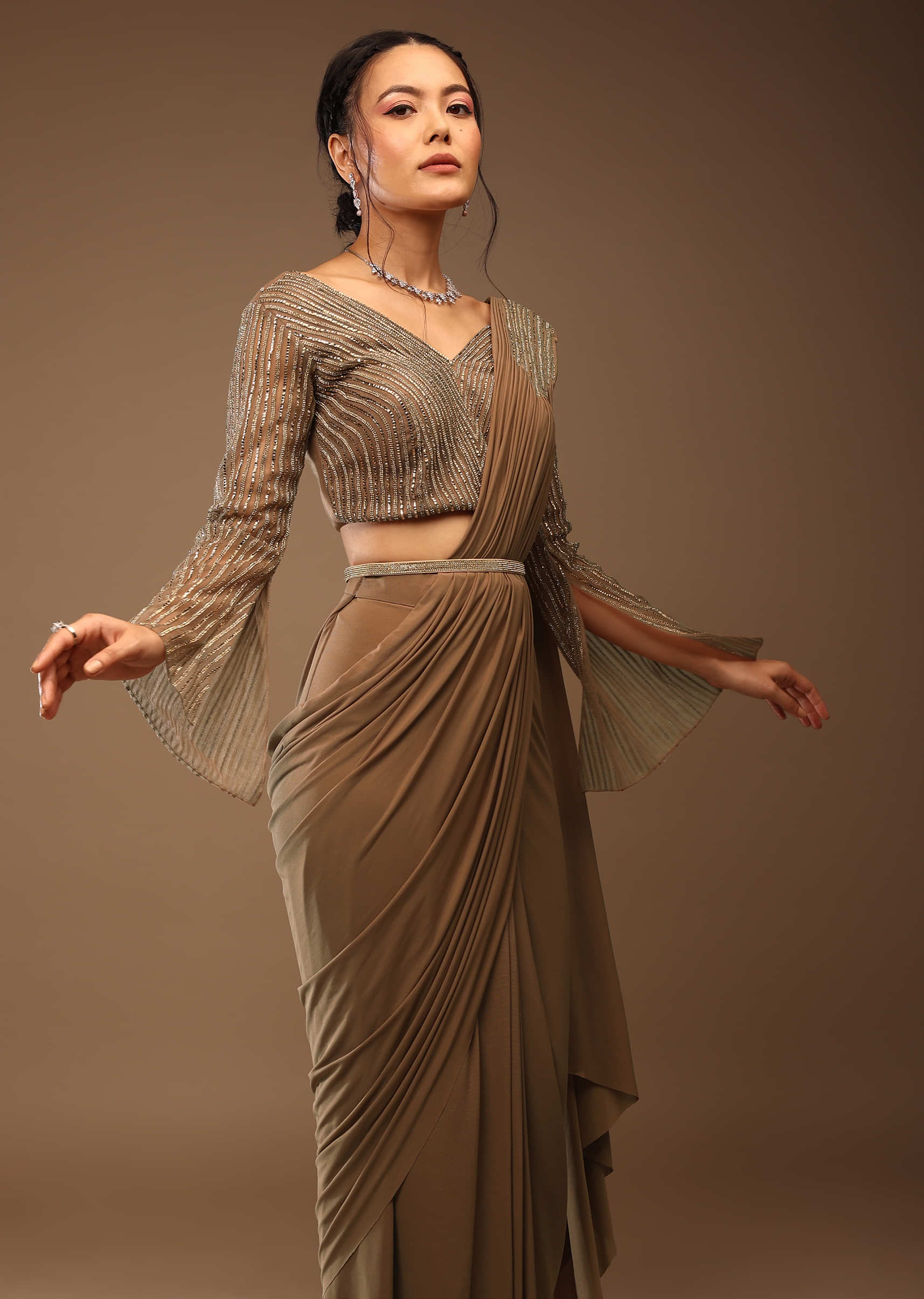 Brownie Color Ready-Pleated Saree With A Crop Top In Stones Embellishment  Crop Top In V Neckline With Stones Embellishment In Bell Sleeves