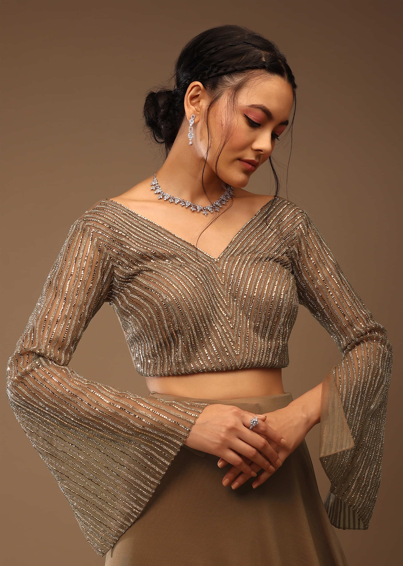 Brownie Color Ready-Pleated Saree With A Crop Top In Stones Embellishment  Crop Top In V Neckline With Stones Embellishment In Bell Sleeves