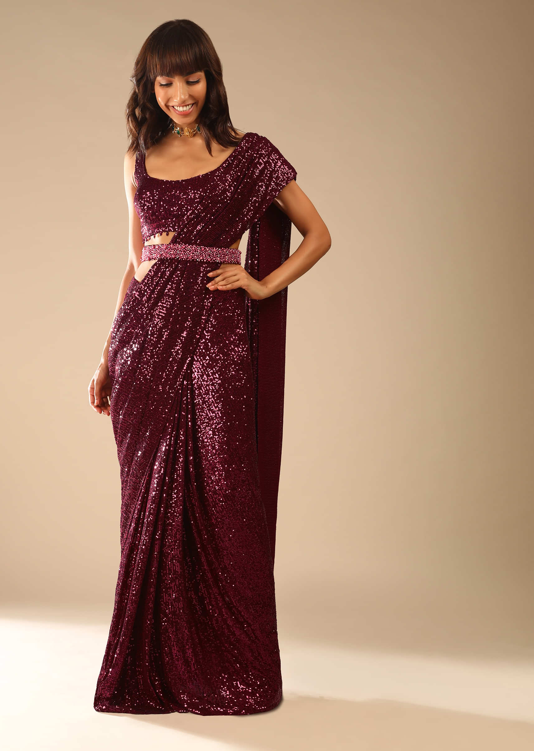 Burgundy Ready Pleated Saree Embellished In Sequins With Bead Fringes, Moti Embellished Belt And Matching Sequins Blouse