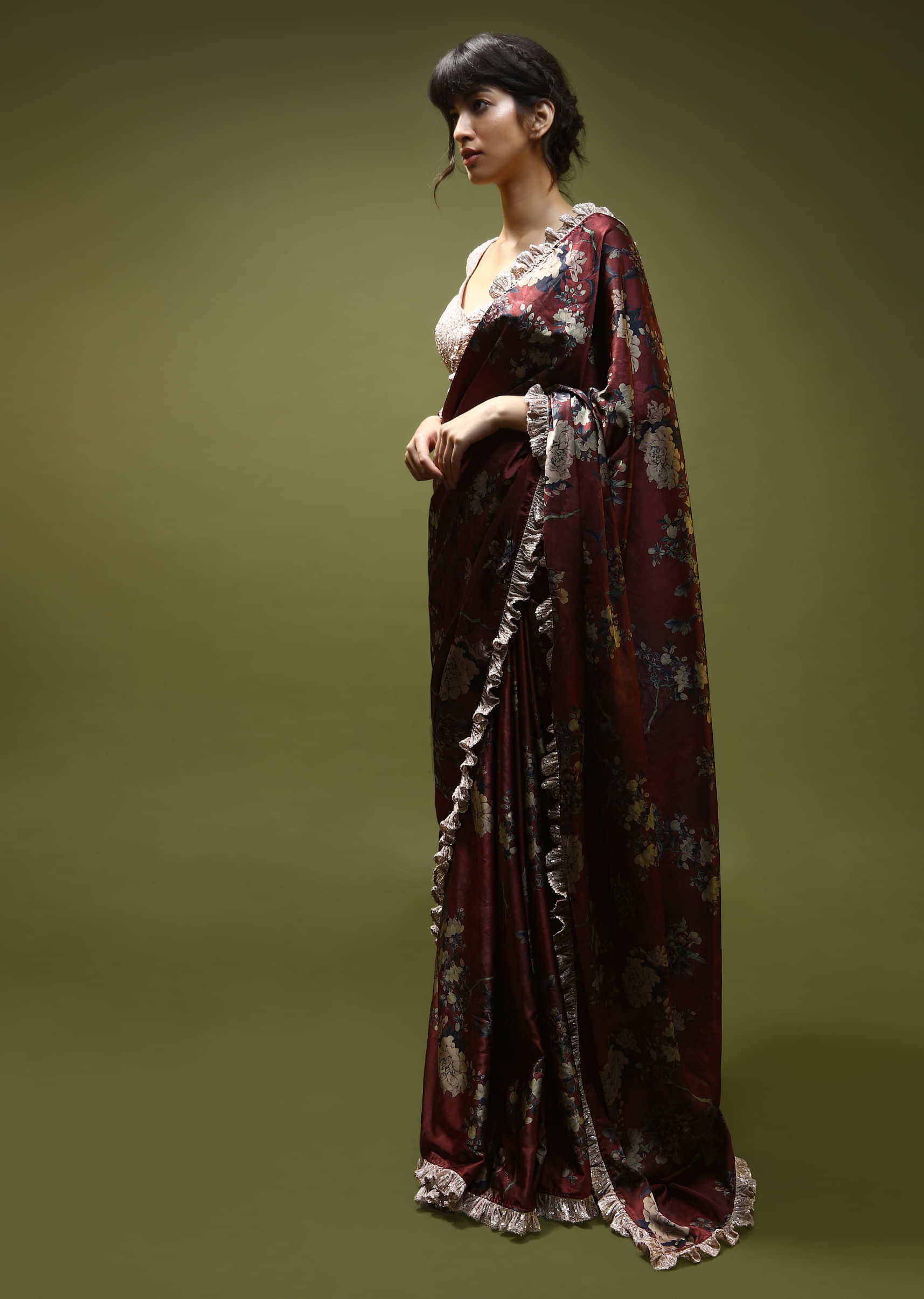Burgundy Red Saree In Satin With Floral Print And Contrasting Peach Sequins Ruffle On The Border And Blouse