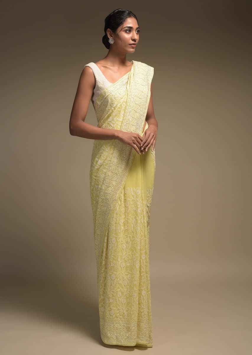 Butter Yellow Saree In Georgette Adorned With Lucknowi Thread Embroidery In Floral Jaal
