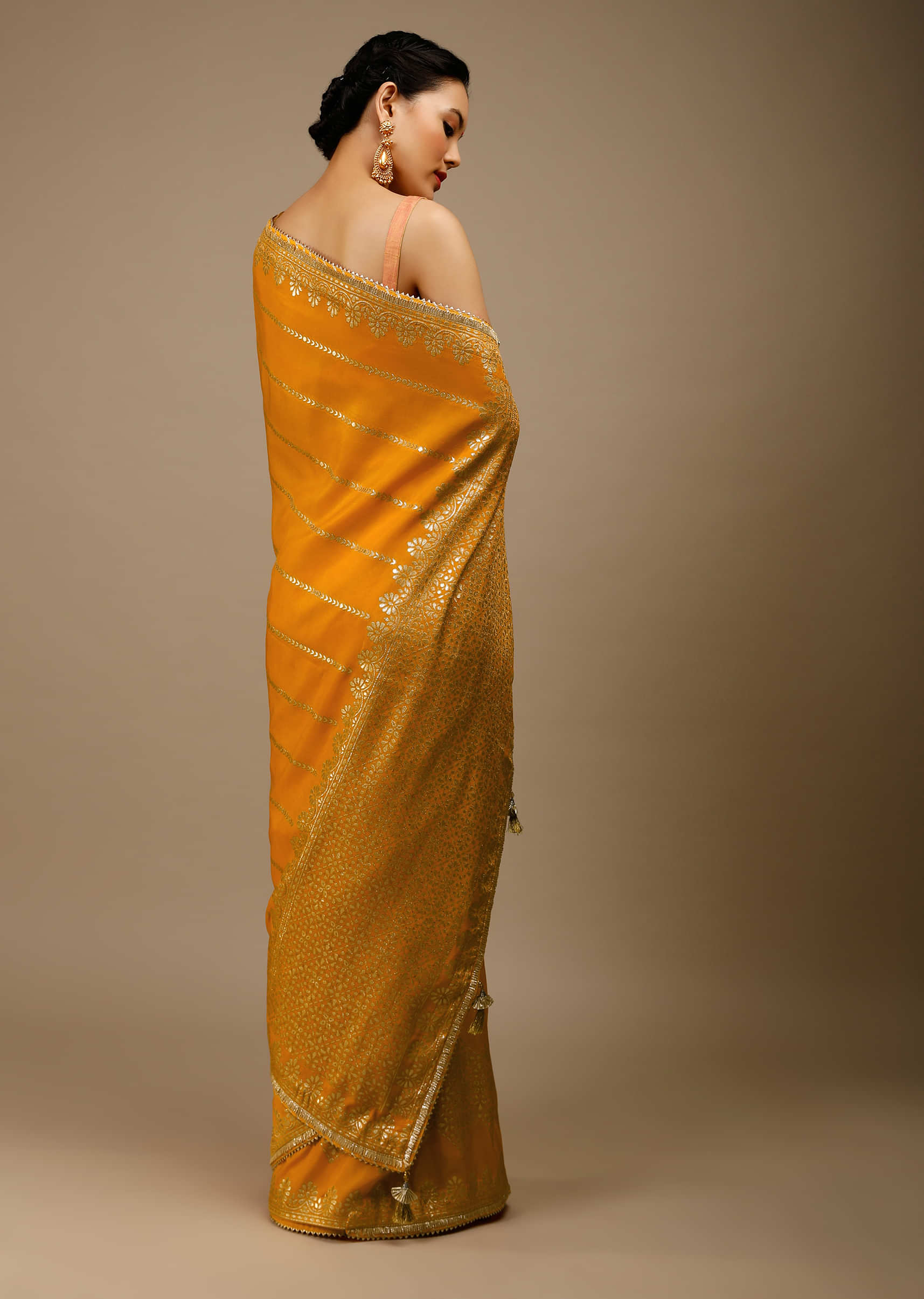 Cadmium Yellow Saree In Dola Silk With Lurex Woven Stripes On The Pallu And Geometric Floral Motifs On The Pleats  