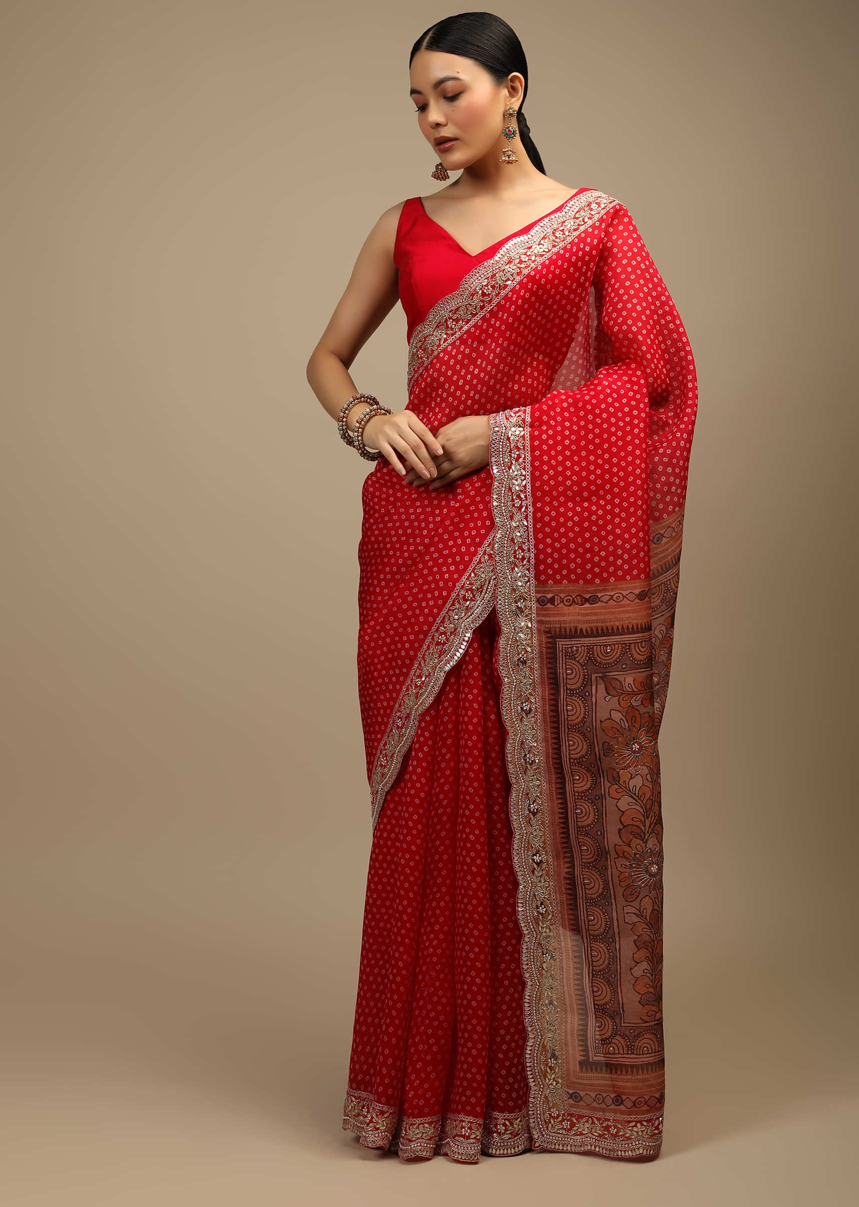 Candy Red Saree In Organza With Bandhani Buttis, Kalamkari Printed Peacock Motifs On The Pallu And Sequins Embroidered Border Online - Kalki Fashion