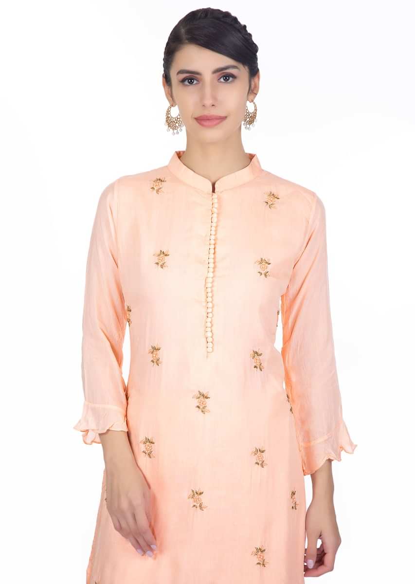 Cantaloupe peach cotton suit in floral embroidered butti with matching sharara pants 