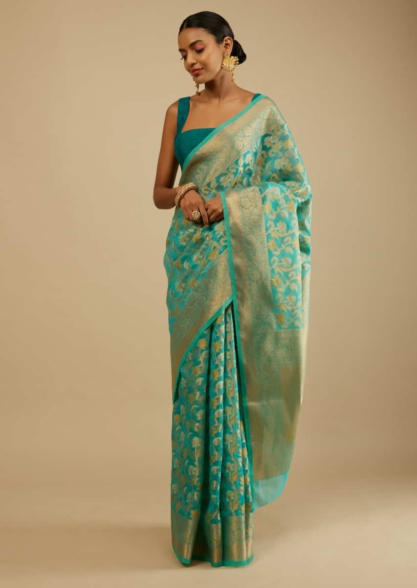 Ceramic Blue Saree In Organza Silk With Woven Floral Jaal In Shades Of Yellow And Gold Along With Unstitched Blouse  