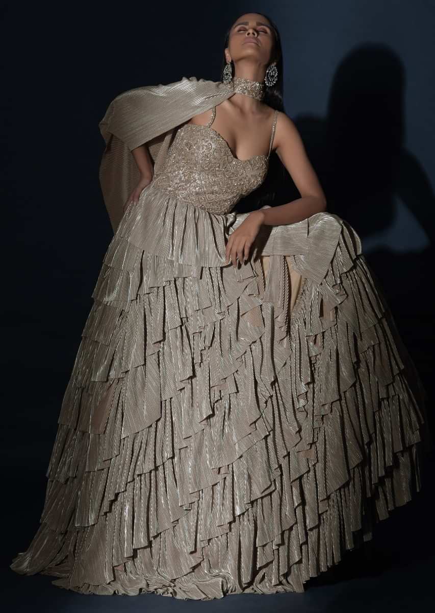 Champagne Gown With Crushed Shimmer Layers And A Fancy One Shoulder Cape