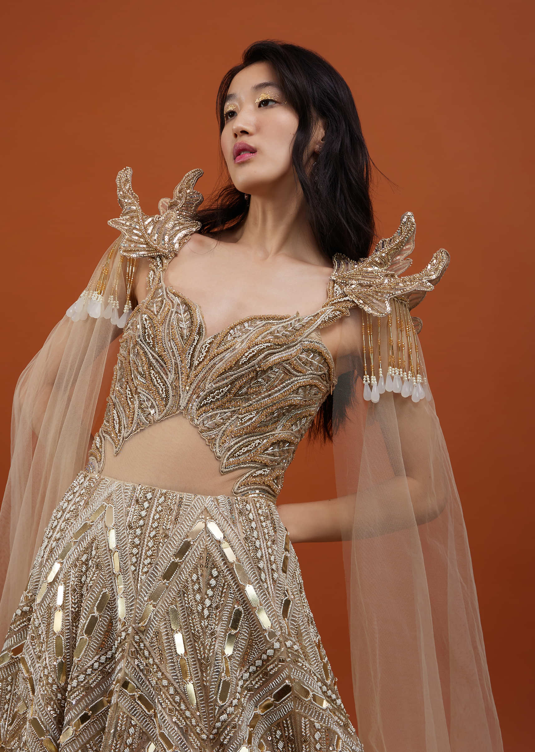 Champagne Gold Divine Gown In Net With Ruffle Frill Adornment - NOOR 2022