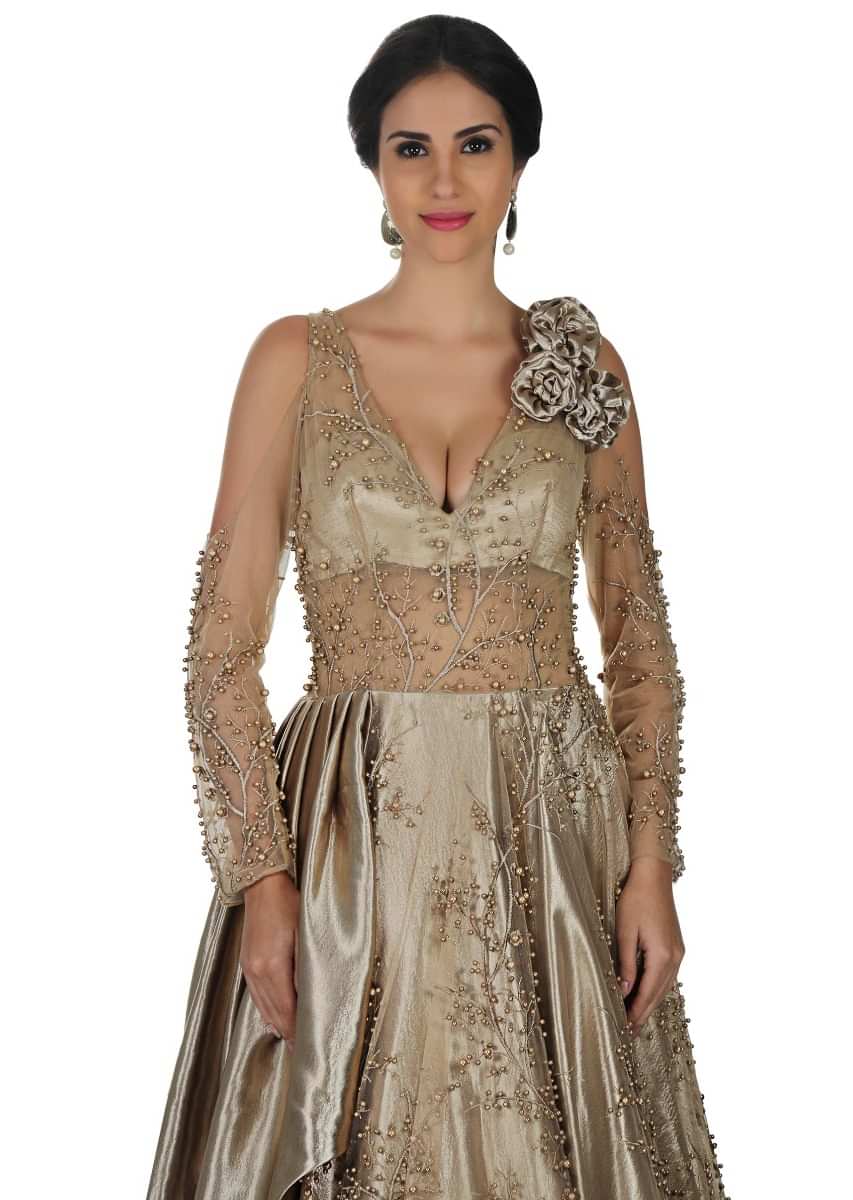 Champagne gold gown in embroidered net and pearl work