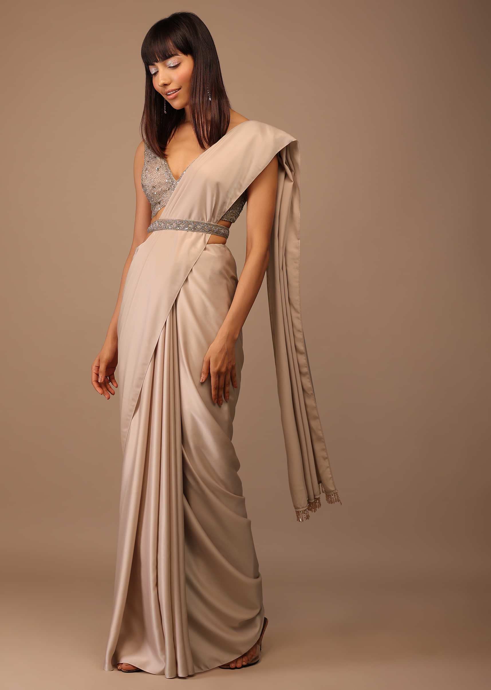 Champagne Satin Saree With Bead Fringes On Pallu Paired With Heavily Embellished  Crop Top