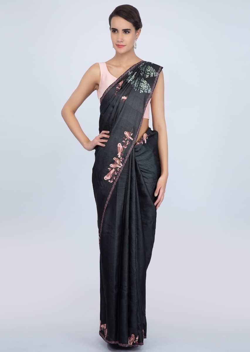 Charcoal grey tussar silk saree with batik printed pallo and bird patch work at the border only on Kalki
