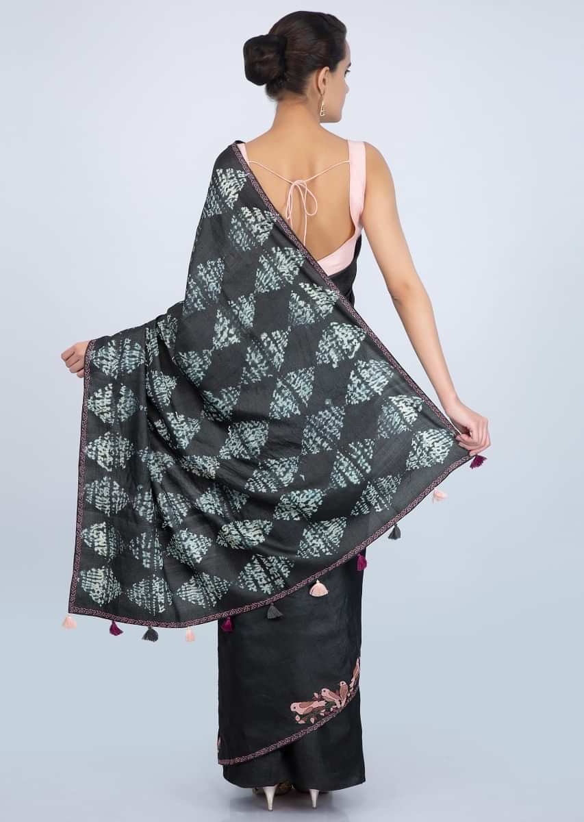 Charcoal grey tussar silk saree with batik printed pallo and bird patch work at the border only on Kalki