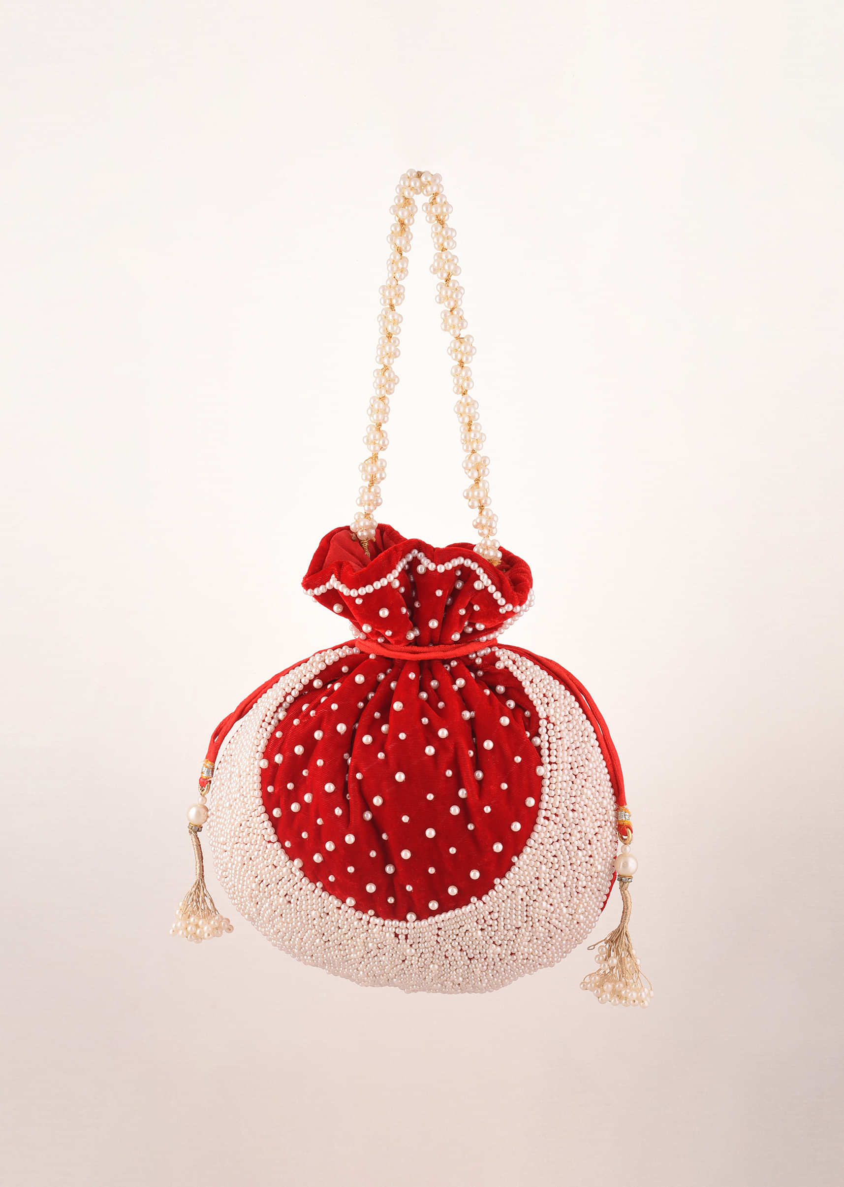 Cherry Red Potli Bag In Velvet With Moti Work In Crescent Design Along The Edge And Scattered In The Centre By Shubham