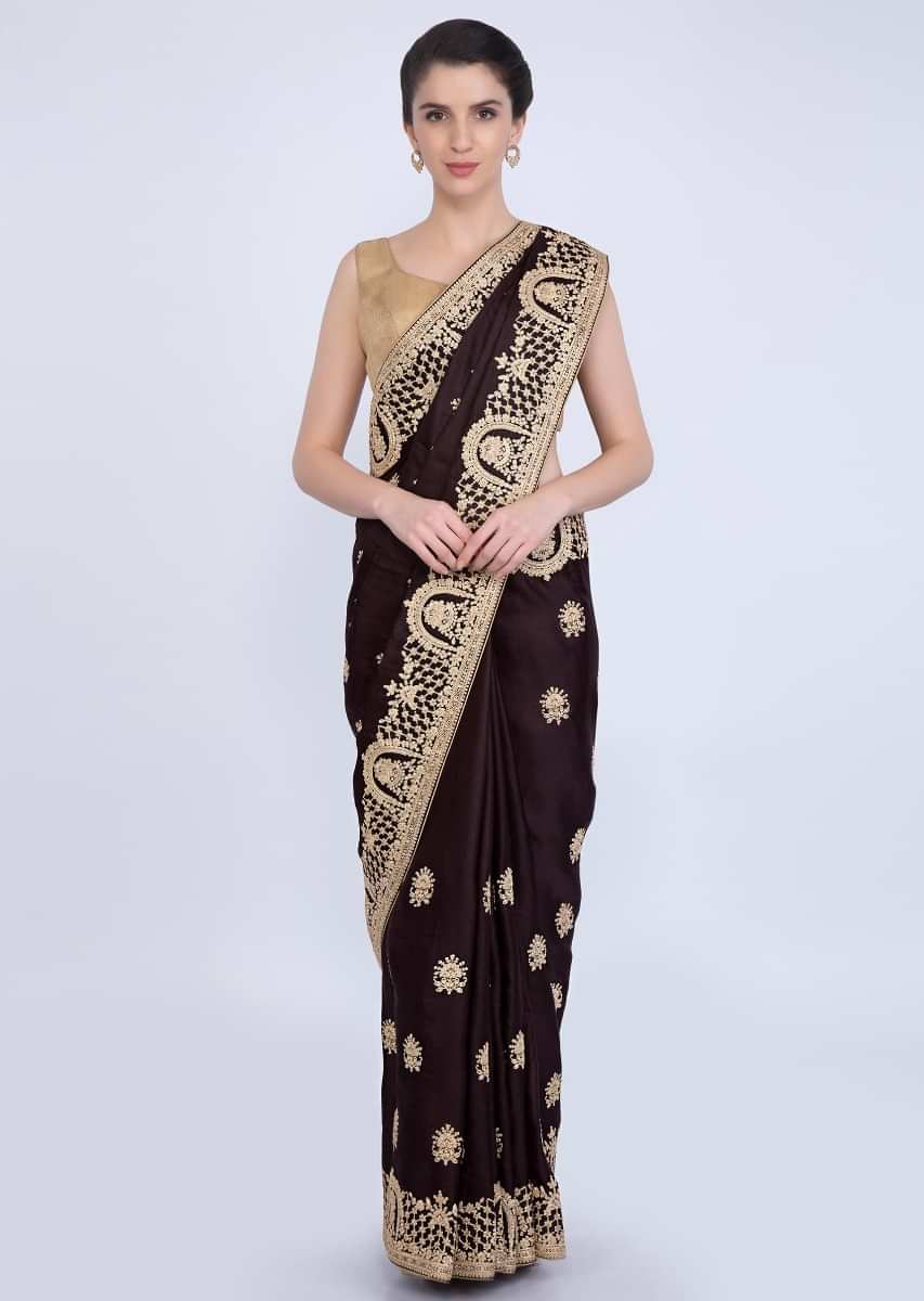 Chocolate brown tussar satin silk saree with floral butti and temple border only on kalki