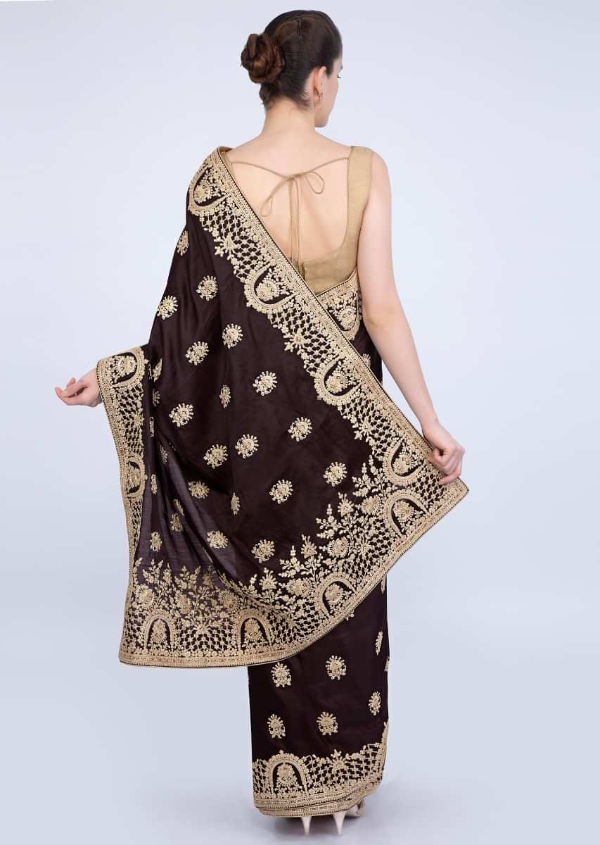 Chocolate brown tussar satin silk saree with floral butti and temple border only on kalki
