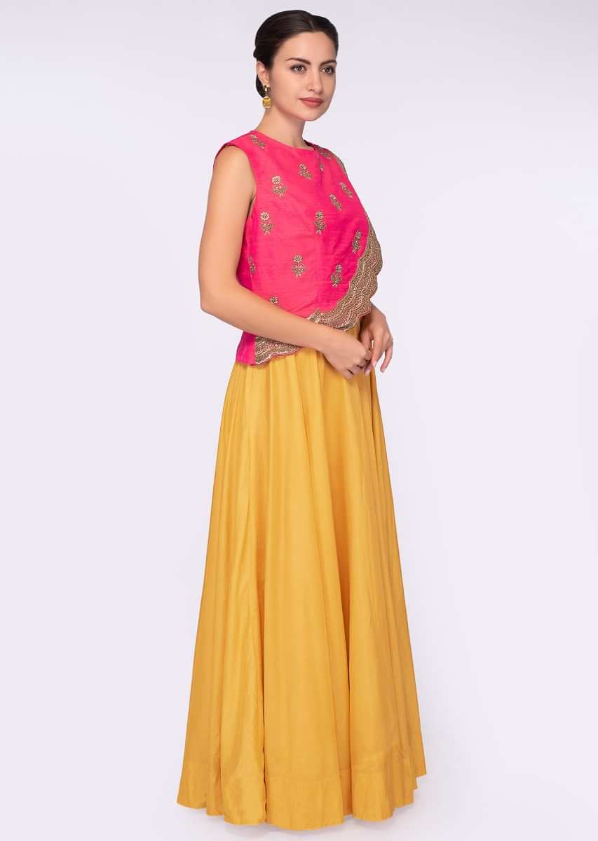 Chrome yellow cotton silk dress teamed with a fancy embroidered top layer
