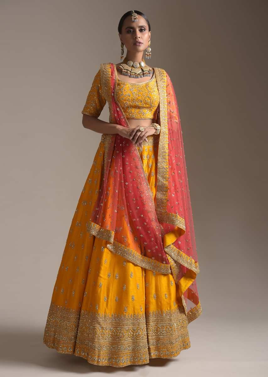 Chrome Yellow Lehenga Choli In Raw Silk With Zari And Sequins Embroidered Buttis And Intricate Border Work 