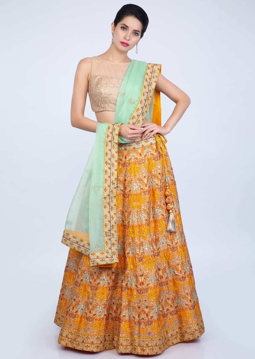 Chrome Yellow Lehenga In Patola Printed Cotton Silk Paired With Sea Green Organza Dupatta Online - Kalki Fashion
