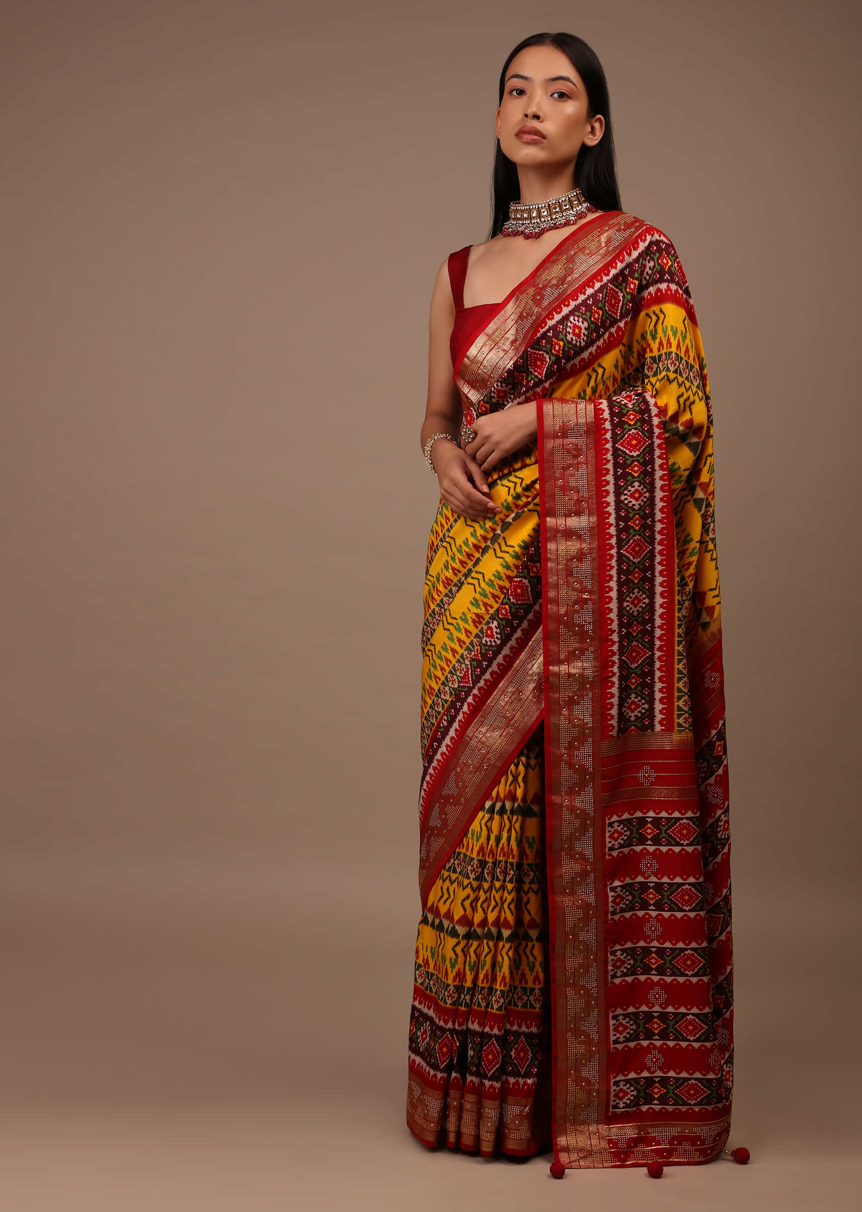 Chrome Yellow Saree In Silk With Multi Colored Patola And Foil Print And Contrasting Maroon Border