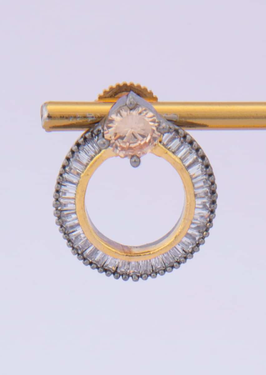 Circular studs adorn with buggle beads along with honey gold stone only on kalki