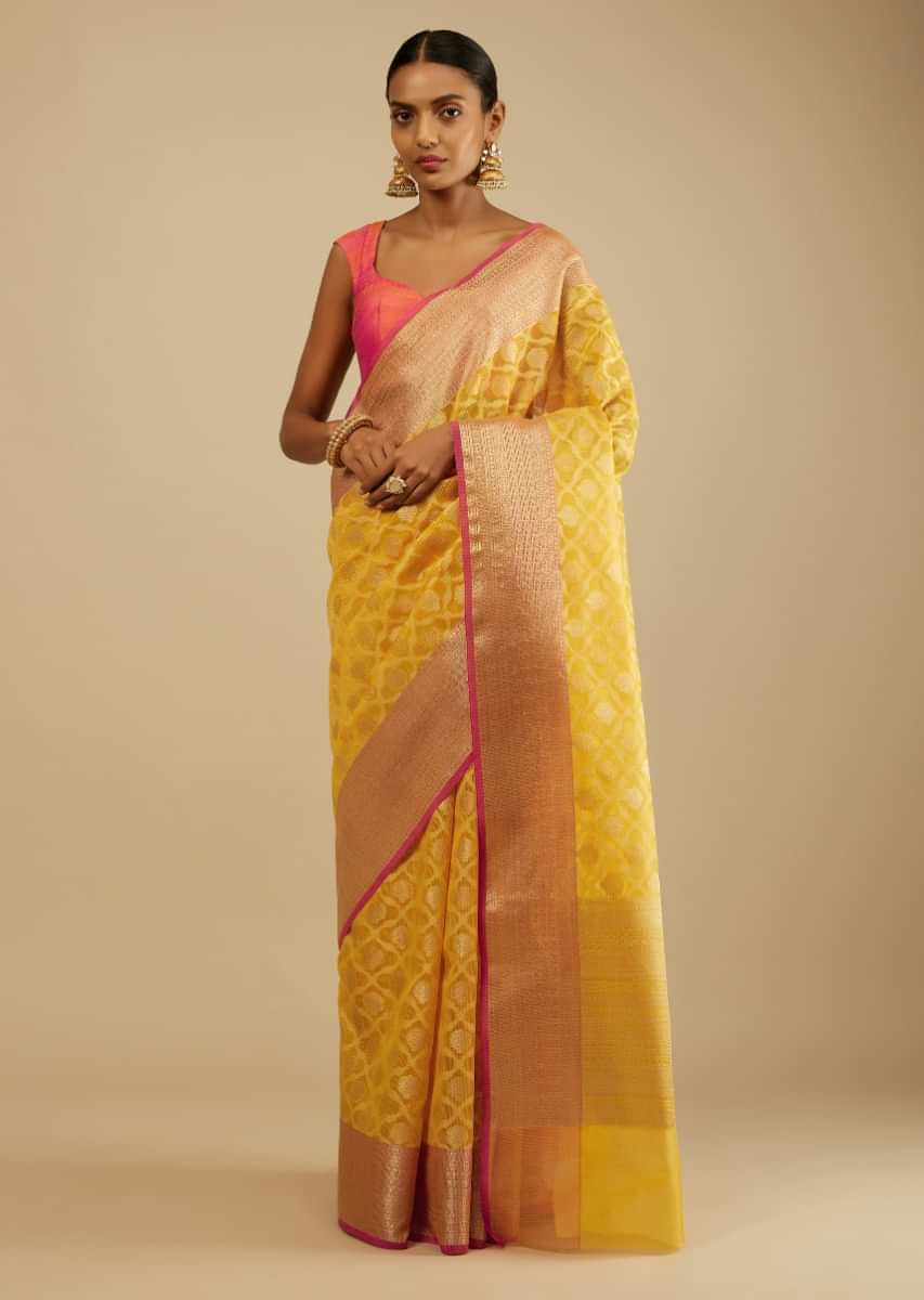 Citrus Yellow Saree In Organza Silk With Woven Moroccan Jaal In Shades Of White And Gold Along With Unstitched Blouse  