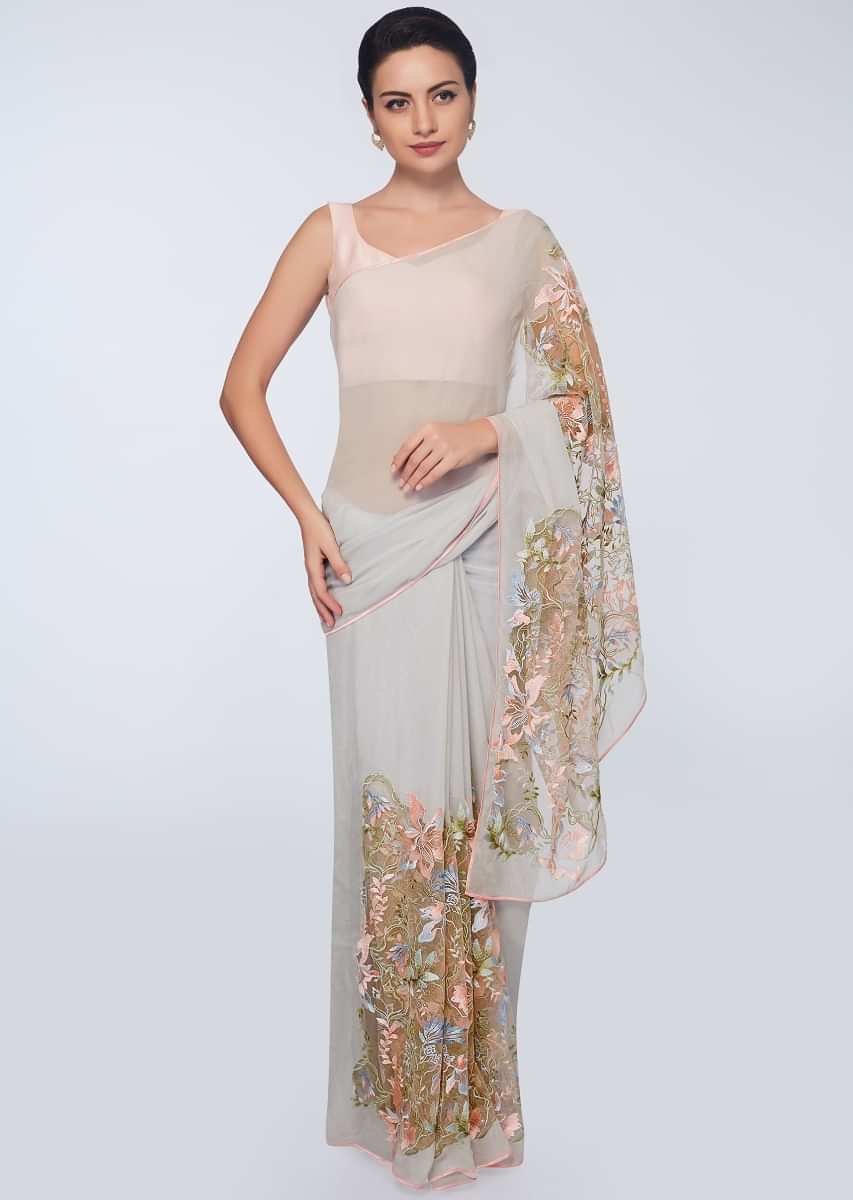 Cloud grey half and half saree featuring in net and georgette