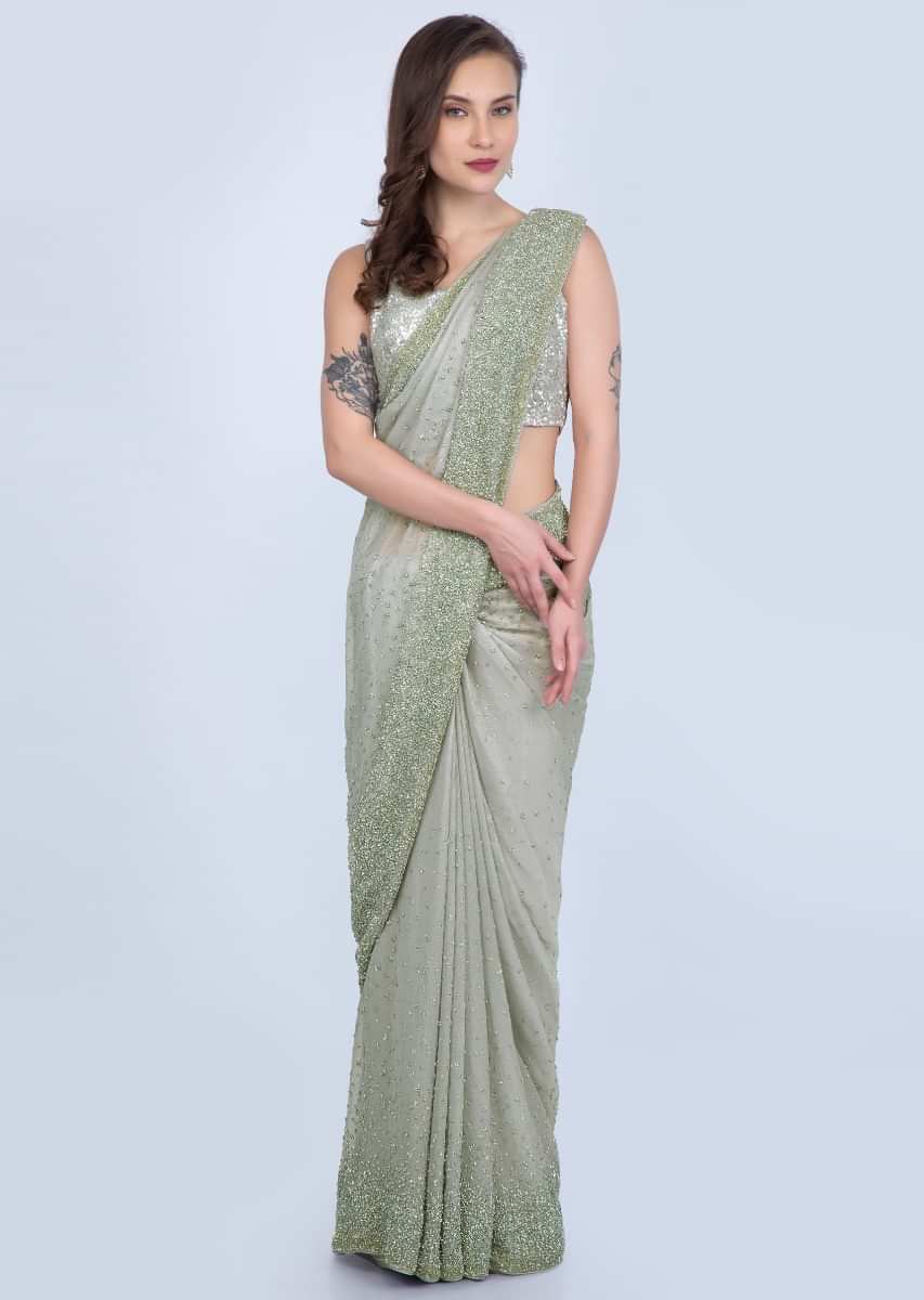 Cloud grey shimmer georgette saree with heavy sequins embroidery only on Kalki