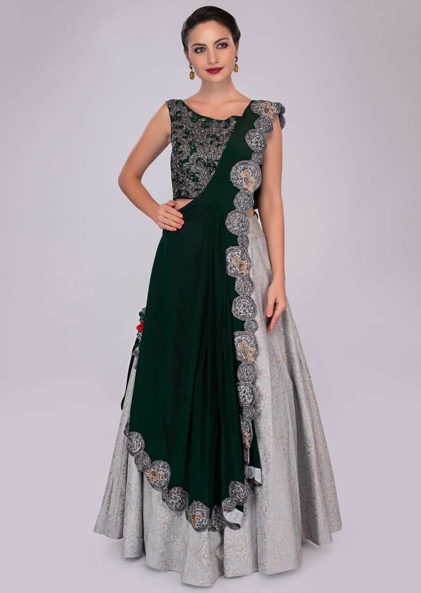 Cloud grey silk skirt paired with rama green embroidered blouse and fancy pre stitched dupatta