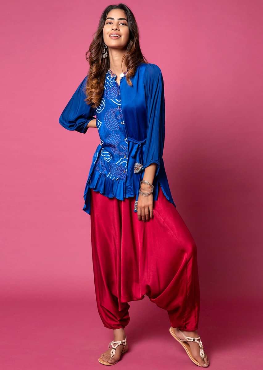 Cobalt Blue Frill Shirt With Bandhani Printed Paisley Motifs, Puff Sleeves And Paired With Scarlet Red Cowl Pants  