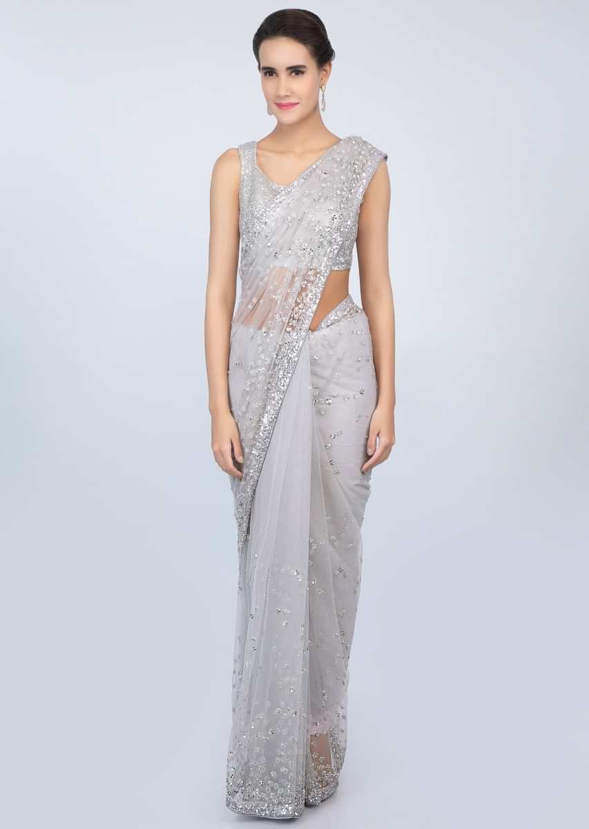Coin grey sheer net saree with sequins embroidered butti and border only on kalki