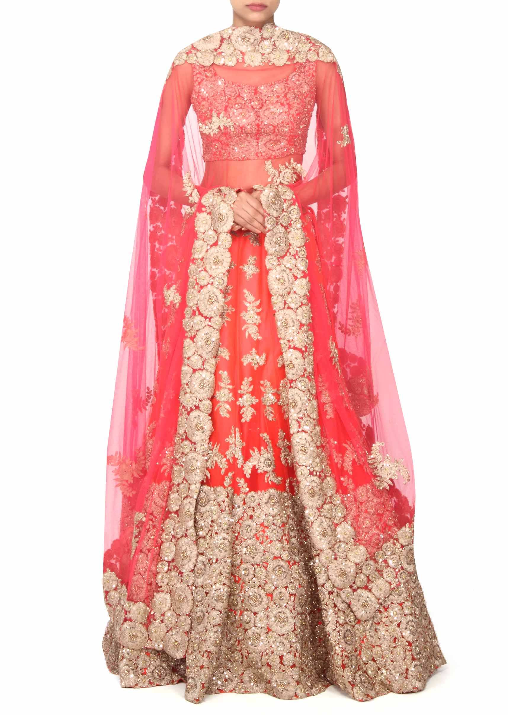 Coral lehenga adorn in zari and sequin embroidery only on Kalki
