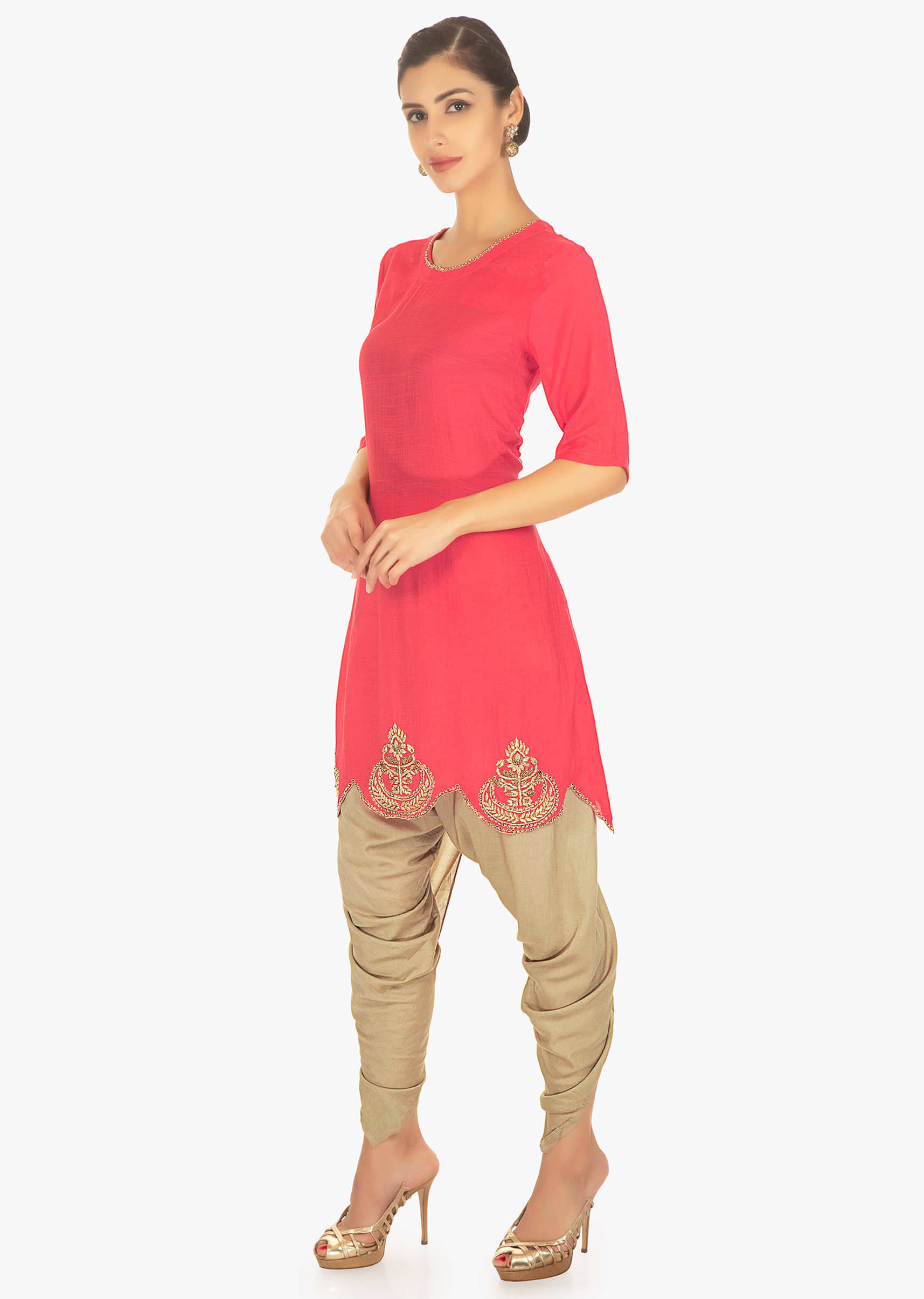 Coral pink silk top paired with a brown cotton dhoti pants