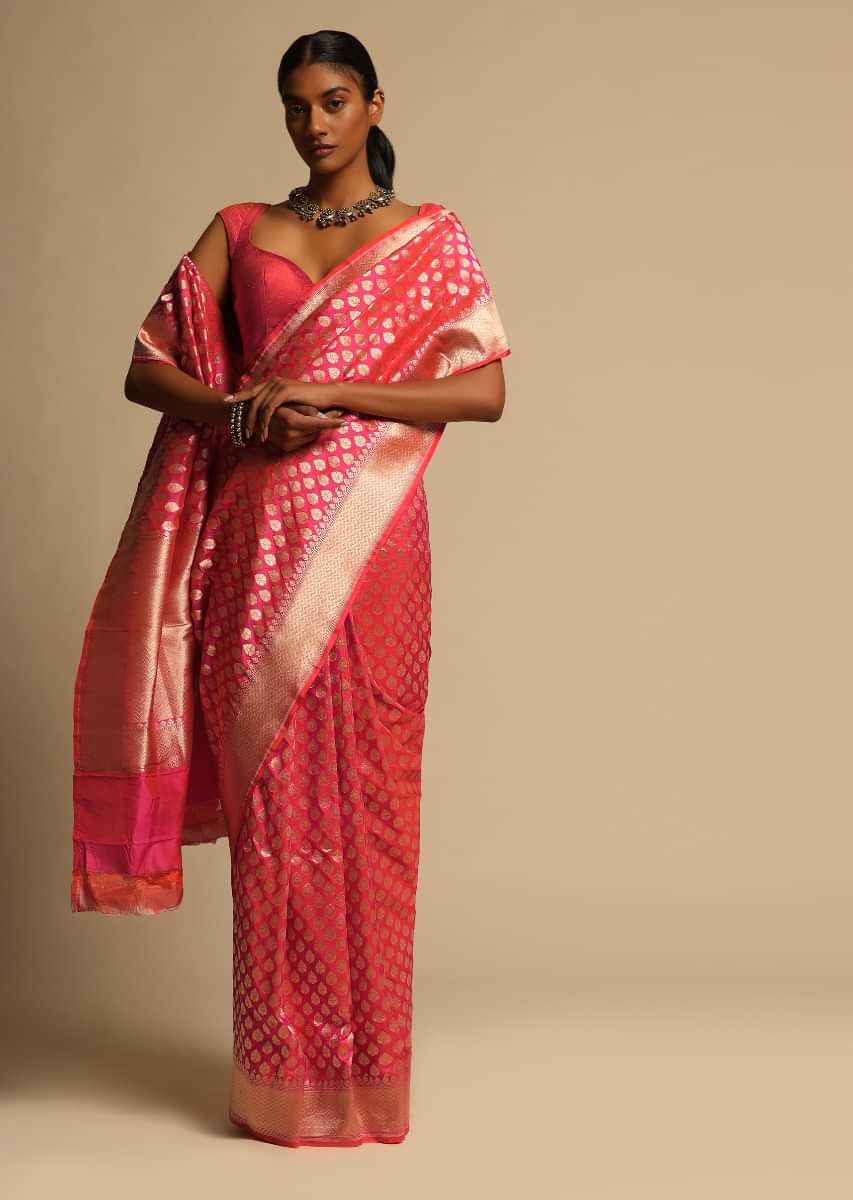 Coral Pink Two Toned Banarasi Saree In Pure Handloom Silk With Woven Floral Buttis And Chevron Border Along With Unstitched Blouse Piece  